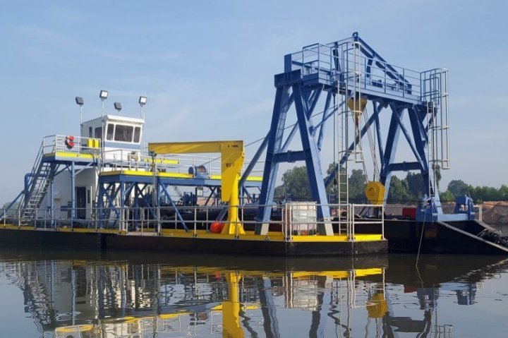 Custom Dredge Works On The River