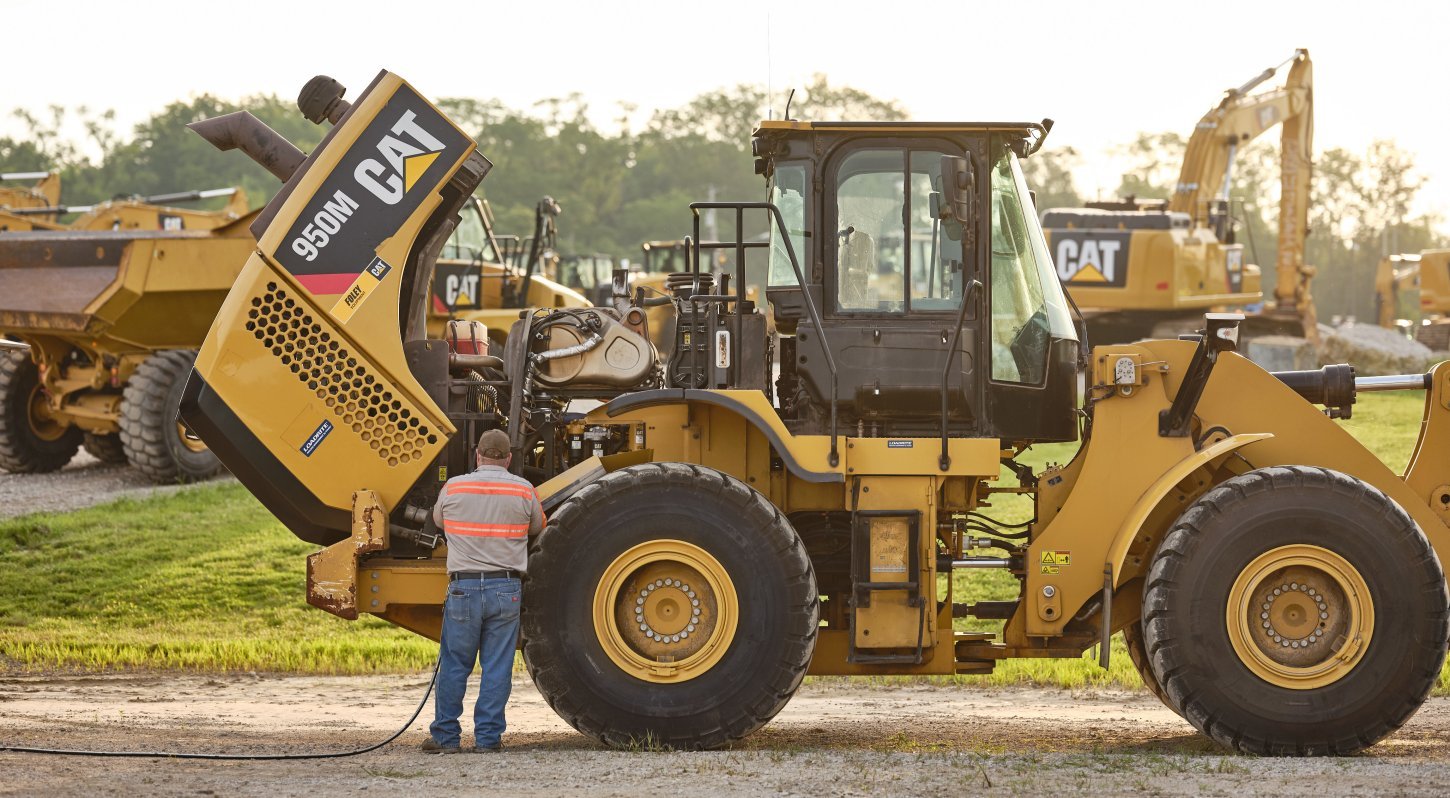 Tech Servicing Machine in the Field