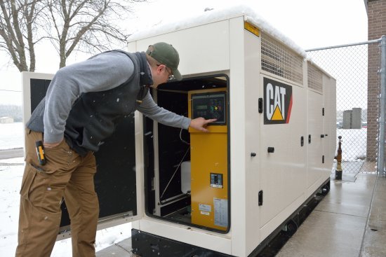 Tech Opening GenSet for Maintenance