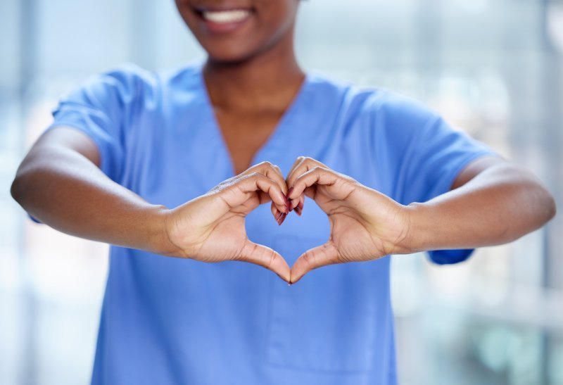 Community Nurse Shaping a Heart